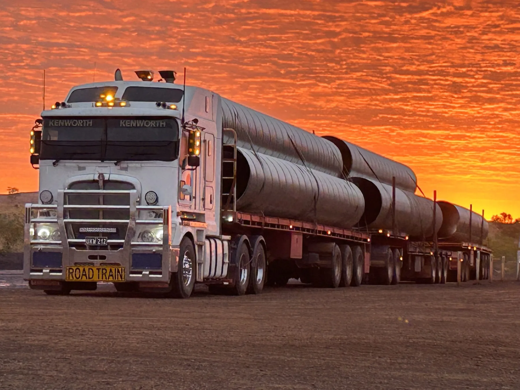 Roundel Civil: road train carrying pipe through the Pilbara